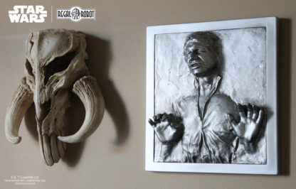 Han Solo Carbonite prop wall art and Mythosaur Skull